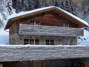 Chalet Alpinum inclusief catering - 10-15 personen - lastminute wintersport aanbiedingen